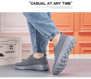 Detail of grey breathable mesh sneakers showing slip-on design and anti-slip EVA outsole