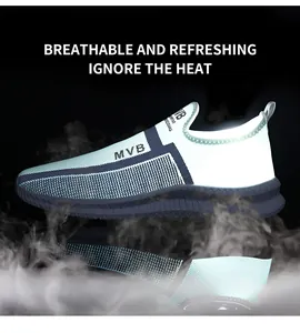 Detail of breathable knit mesh upper on white and navy slip-on sneakers with MVB logo
