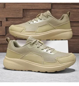 Detail view of khaki wide-toe sneakers featuring breathable mesh and thick cushioned soles