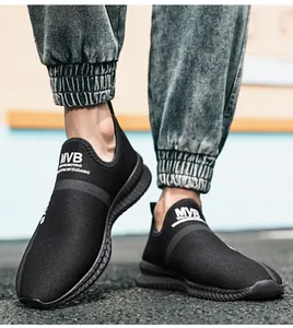 Detail of breathable black mesh slip-on sneaker with MVB logo and thick rubber sole