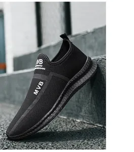 Detailed macro shot of black breathable knitted slip-on sports shoes for men