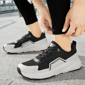 Men's wide-toe running shoes in black and grey mesh, featuring thick cushioning soles