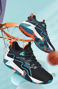 Detail view of high-top basketball shoe with non-slip rubber sole and wave traction pattern