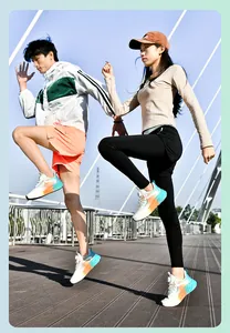 Action shot of breathable mesh running shoes with rotation buckle on an outdoor bridge