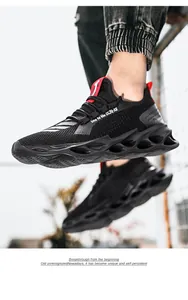 Detail of men's breathable fly-knit sneakers with wave-shaped blade soles in black and red
