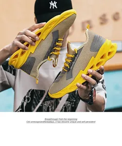 Detail of breathable brown mesh upper and yellow hollow sole on men's running shoes