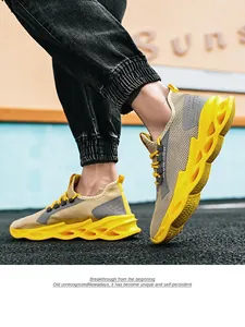 Detail of breathable knit mesh upper and yellow hollow cushioning sole on men's sneakers