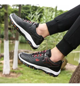 Men's outdoor hiking shoes featuring a durable synthetic leather upper and non-slip rubber sole