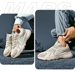 Close-up of beige and brown retro sneakers with thick soles and breathable mesh