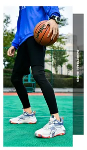 Action shot of men's breathable basketball shoes with rubber sole on court