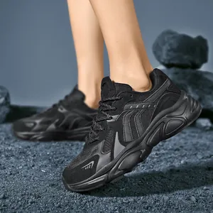 Chunky unisex dad sneakers in black breathable mesh and faux suede with thick rugged soles