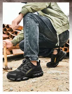 Detail of black breathable safety shoe with steel toe and knob lacing system in industrial site
