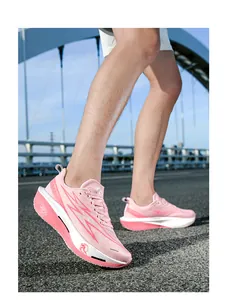 Pink cushioned running shoes for women with breathable mesh and thick sport soles