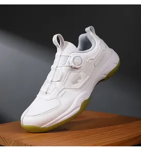Close-up of breathable mesh upper and quick-lace rotary buckle system on white sports shoes
