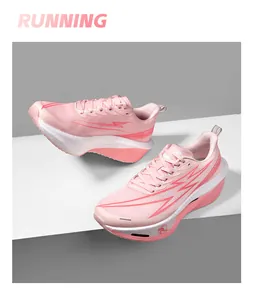 Detail shot of pink cushioned running shoe with breathable mesh and thick foam sole