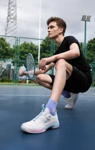 Detail of professional athletic shoe with BOA lacing system and blue gradient sole