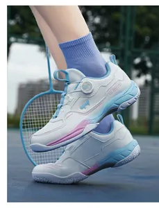 Detail of professional badminton shoes showing breathable mesh and quick-lace dial system