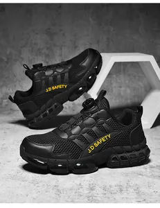 Detail view of black safety work shoes featuring breathable mesh and auto-knob lacing system