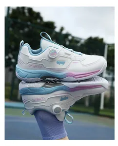 Detail of breathable athletic shoe with quick-lace dial and vibrant gradient accents
