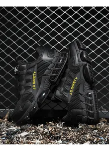 Detail of safety shoes with mesh upper, rotary lace system, and cushioned sole