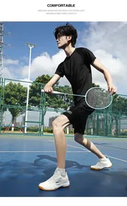 Outdoor shot of men's black breathable and quick-dry athletic t-shirt and shorts set