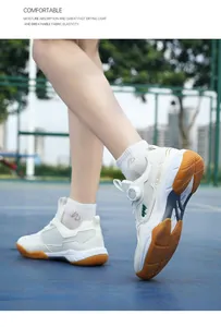 Detail view of white badminton shoes with breathable mesh and rubber anti-slip sole