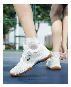 Detail of white athletic training shoes with breathable mesh and rotating dial lace system
