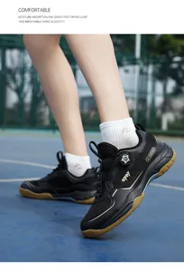 Detail of professional black training shoe with rotary buckle and non-slip rubber sole