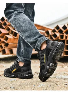 Detail of steel toe safety shoes featuring breathable mesh and slip-resistant soles