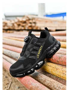 Detail of safety shoe with breathable mesh upper and quick-lace rotary knob closure