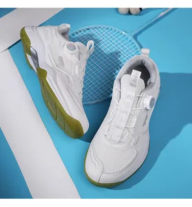 Close-up of professional white badminton shoes with breathable mesh and knob lacing system