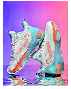 Close-up of high-top basketball shoes with white mesh and orange gradient cushioning