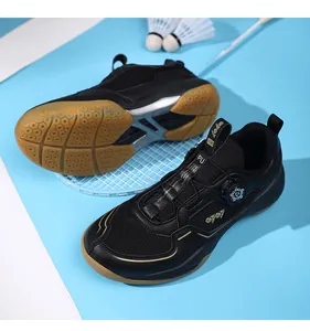 Detail view of pro badminton shoe showing honeycomb rubber grip and dial lacing system