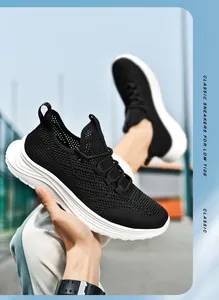 Detailed close-up of the breathable knitted mesh and thick wave-pattern sole of black sneakers