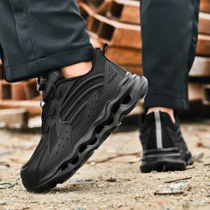 Men's safety shoes with steel toe cap and rotary dial lace system in industrial setting
