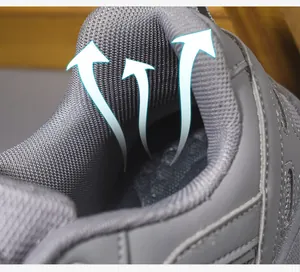 Macro detail of breathable honeycomb mesh lining in gray hiking shoes for airflow