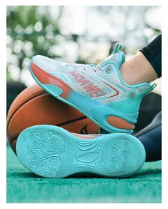 Detail of blue basketball shoes showing non-slip rubber sole and shock-absorbing material