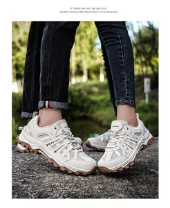 Outdoor shot of stylish retro hiking shoes with mesh upper and thick non-slip rubber soles