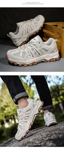 Close-up of cream hiking shoes featuring mesh panels and a rugged brown lug rubber sole