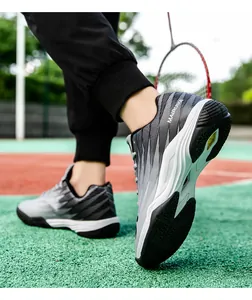 Close-up of non-slip rubber outsole and gradient design on professional court sneakers