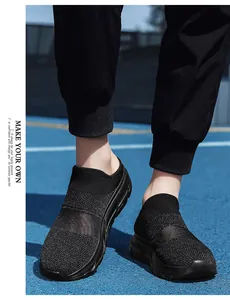 Detail of black knit slip-on sneakers with woven texture and thick soles for sports