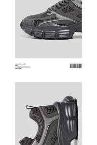 Detailansicht der dunkelgrauen Dad Shoes mit atmungsaktivem Mesh und klobiger Gummisohle