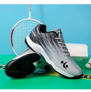 Detail view of anti-slip rubber outsole and dot-textured upper of badminton shoes