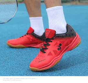 Detailed side view of breathable mesh red professional badminton shoes for sport training