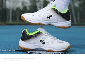 Detail of breathable white mesh badminton shoe with anti-slip rubber sole and sport graphics