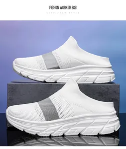 Detail view of white breathable knit upper and thick slip-resistant sole on sport slides