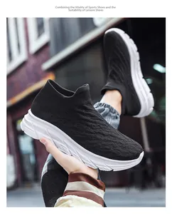 Detail of black breathable mesh walking shoe with a thick white EVA cushioned sole