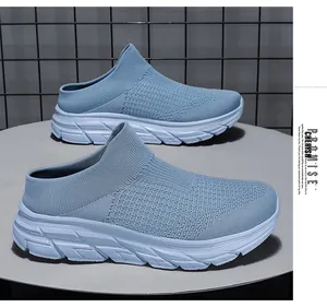 Close-up of light blue fly-knit slip-on walking shoes with thick white cushioned soles