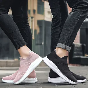 Breathable mesh slip-on sports shoes for men and women in pink and black colors
