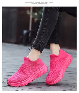Detail of pink breathable mesh walking sneakers with comfortable thick sole for women